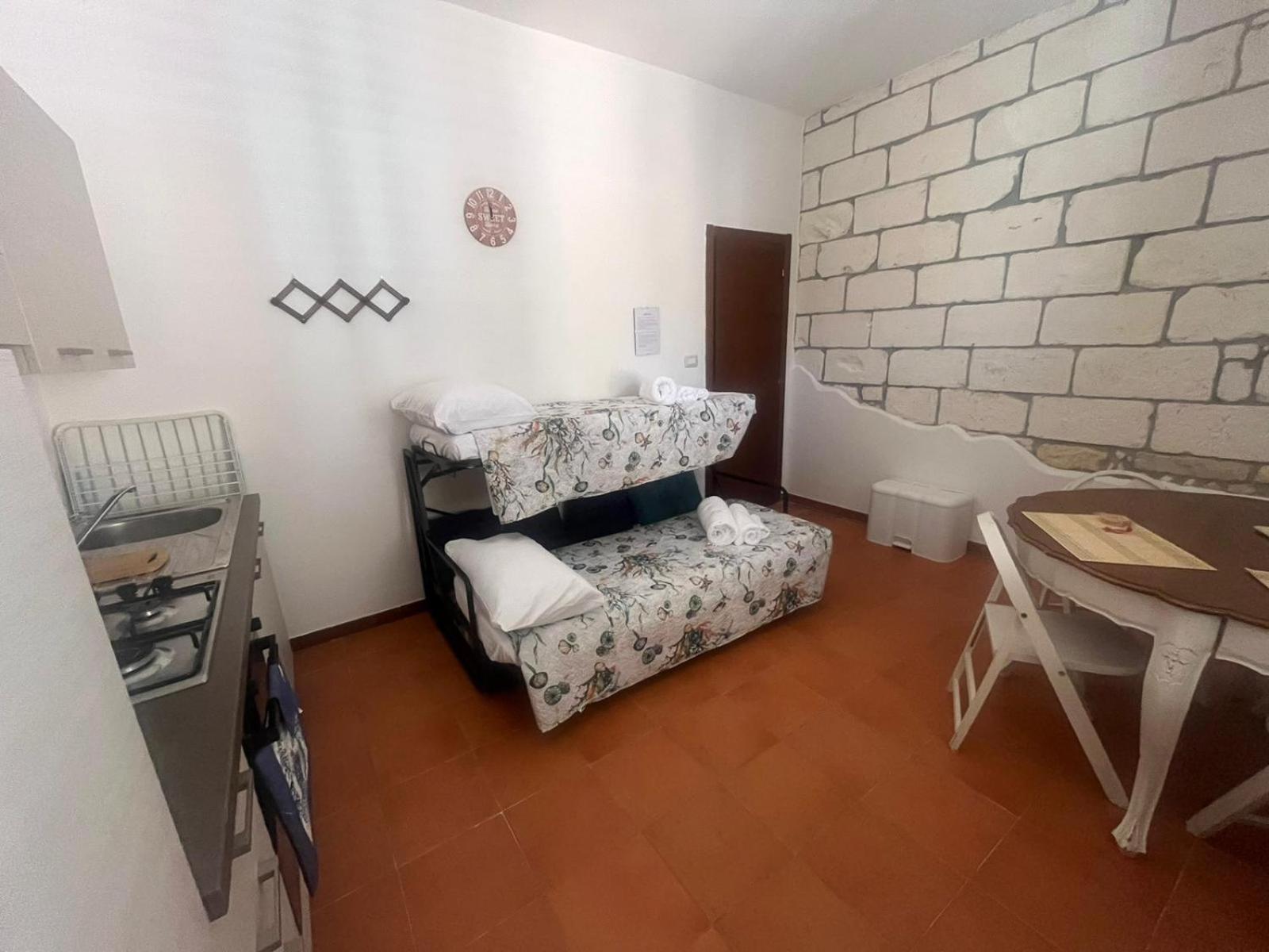 Moncici House Hotel Porto Torres Buitenkant foto